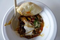 Shakshukit – a deconstructed kebab of minced beef and lamb with yoghurt, tahini, watercress pesto, tapenade, Harrisa and a mini pita from The Palomar