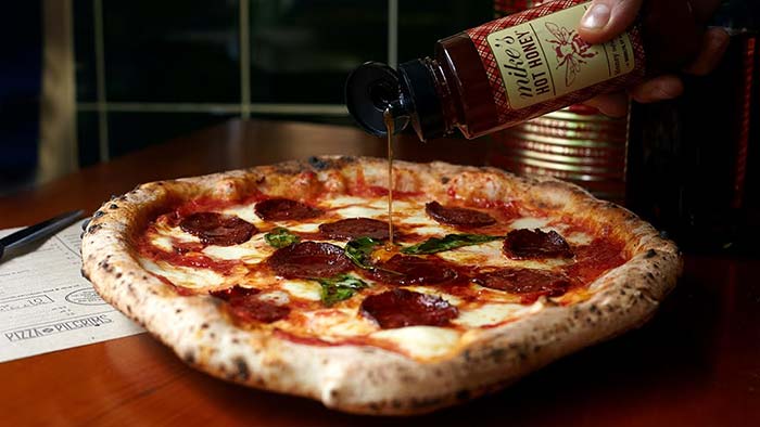 Pizza Pilgrims team up with Paulie Gee's to bring Mike's Hot Honey to the UK