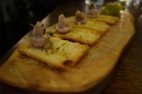 Whipped lardo crostini with guindilla