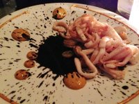 Squid with black mole, potatoes and choizo mayonaise from Empellon Cocina