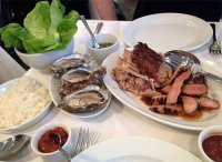 The full pulled pork course, with shoulder, ribeye, oysters, kimchi and lettuce