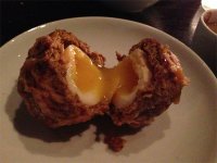 Chicken chorizo and masa tempura Scotch egg from Empellon Cocina