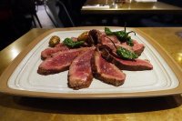 Presa Iberico with fried peppers and roasted Jersey Royals