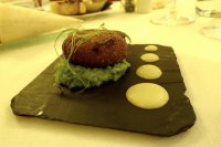 Salmon and preserved lemon fish cake with crushed peas and tartar sauce