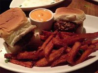 Bbq, braised short rib sliders, sweet potato fries, smoked paprika aioli at Traif