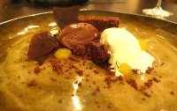 Dark chocolate torte with chocolate mousse, chocolate aero, malt ice cream and mandarin