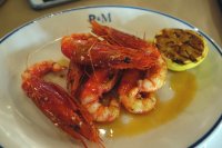 Cooked red prawns with lemon, olive oil and salt