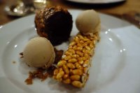 Chocolate marquise with salted caramel puffed rice and praline ice cream