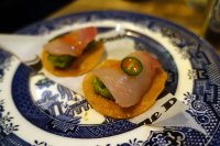 Yellowtail sashimi tostada – avocado shiso