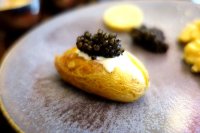 Roast baby potatoes with sour cream and caviar