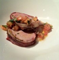 Roast loin of Gloucester Old Spot pork with wild mushroom stuffing, wrapped in pancetta and served with a tarragon sauce vierge