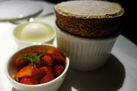 Strawberry soufflé, macerated strawberry salad, yoghurt sorbet 