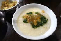 congee with crispy chicken skins and dough sticks