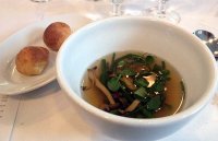 Eel Dashi, peas and samphire served with choux pastry filled with brandade