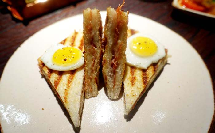 Jamon, manchego toastie, quail’s eggs