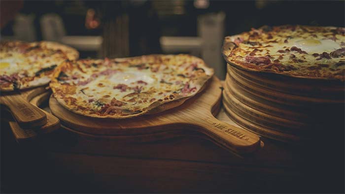 Cider and pizza from The Stable's in Whitechapel