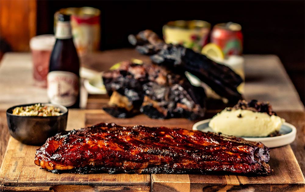 Red Dog Soho returns with Austin-style barbecue on the menu