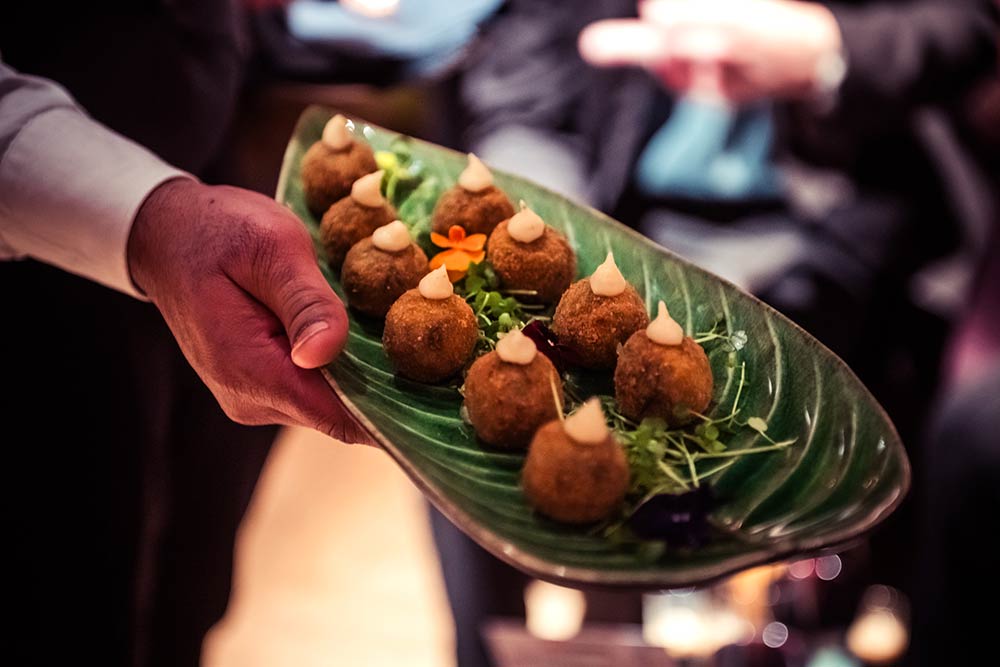 Clonakilty white & black pudding & potato bon-bon, cider & apple puree