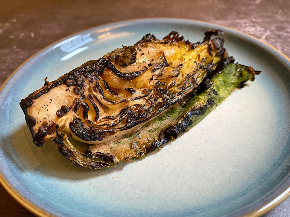 Black Axe Mangal grilled hispi with fermented shrimp butter