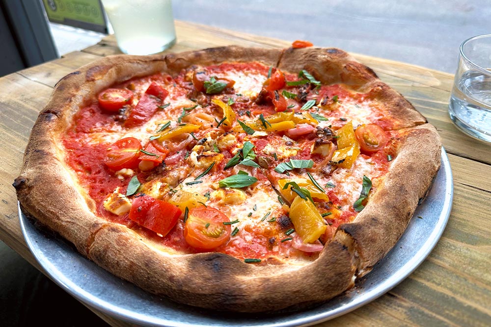 Little Pizza Hicce - Grilled peppers, tomato, mozzarella fior di latte, goat's cheese, shallot, honey, walnut, rosemary